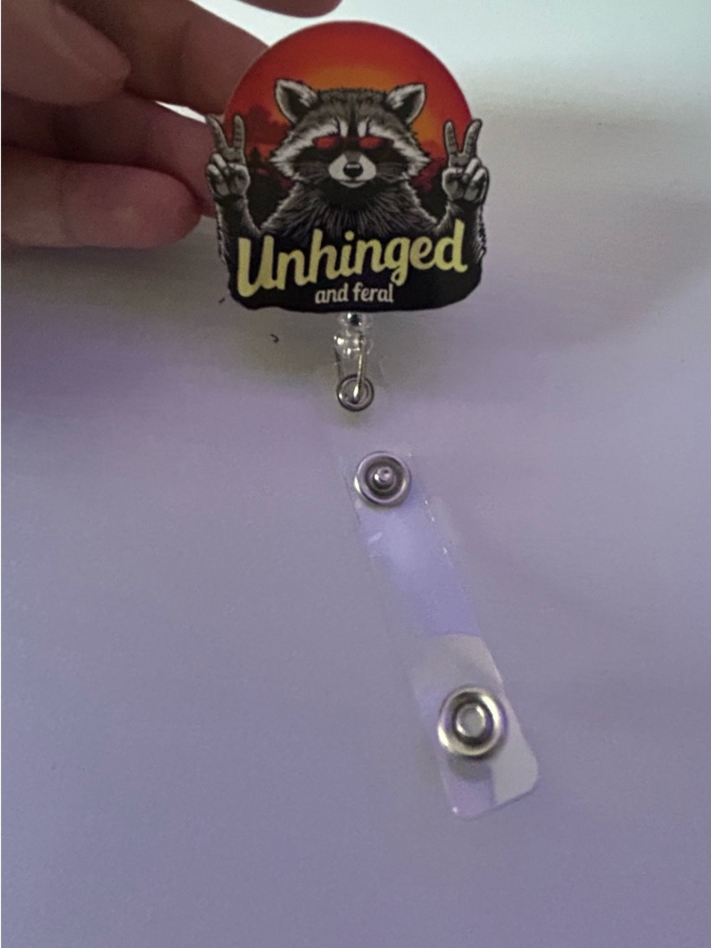 Unhinged and Feral Raccoon Badge Reel - Red & Black